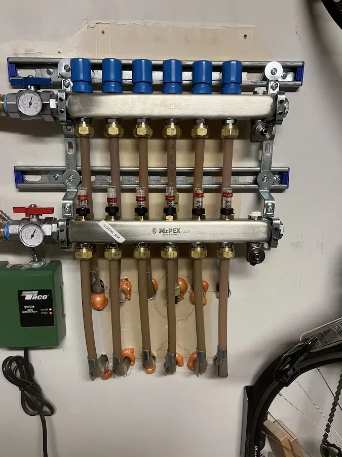 Plumber performing Leak Detection at a residential property in Hudsonville